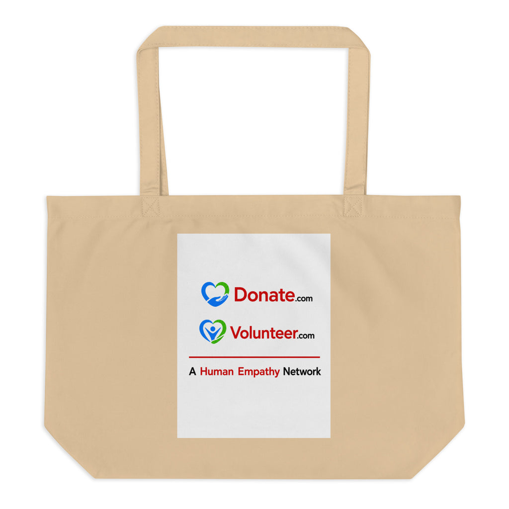 An oyster colored canvas tote bag with two shoulder straps, featuring a white rectangular printed panel on the front with the Donate.com and Volunteer.com logos and A Human Empathy Network description