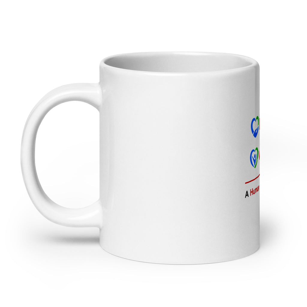 A white ceramic coffee mug with a printed graphic featuring the Donate.com and Volunteer logos - A Human Empathy Network